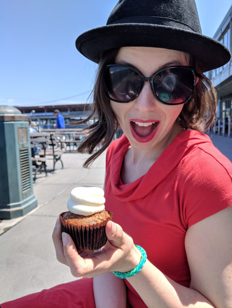 Kati Keksi out and about with a cupcake on holiday.