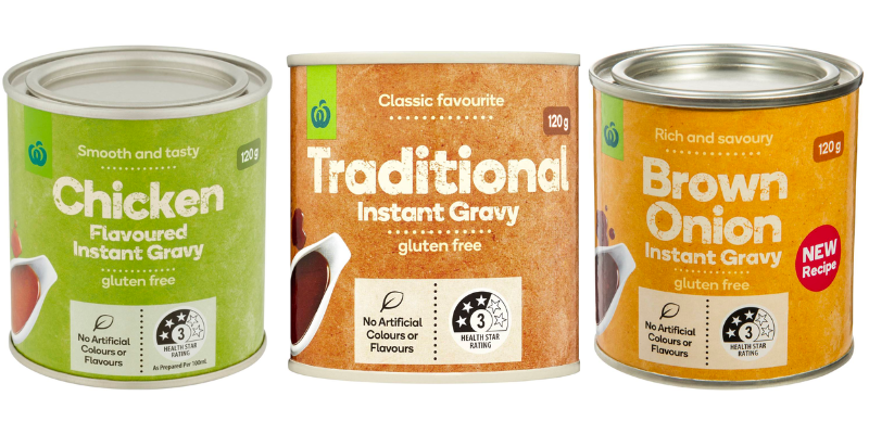 Packaging of three tins of woolworths brand gravy powders all gluten free written on the front.