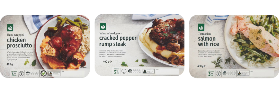 The packaging of three Woolworths ready meals.